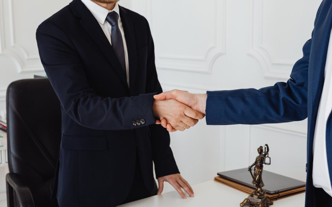 Two men shaking hands over a done deal